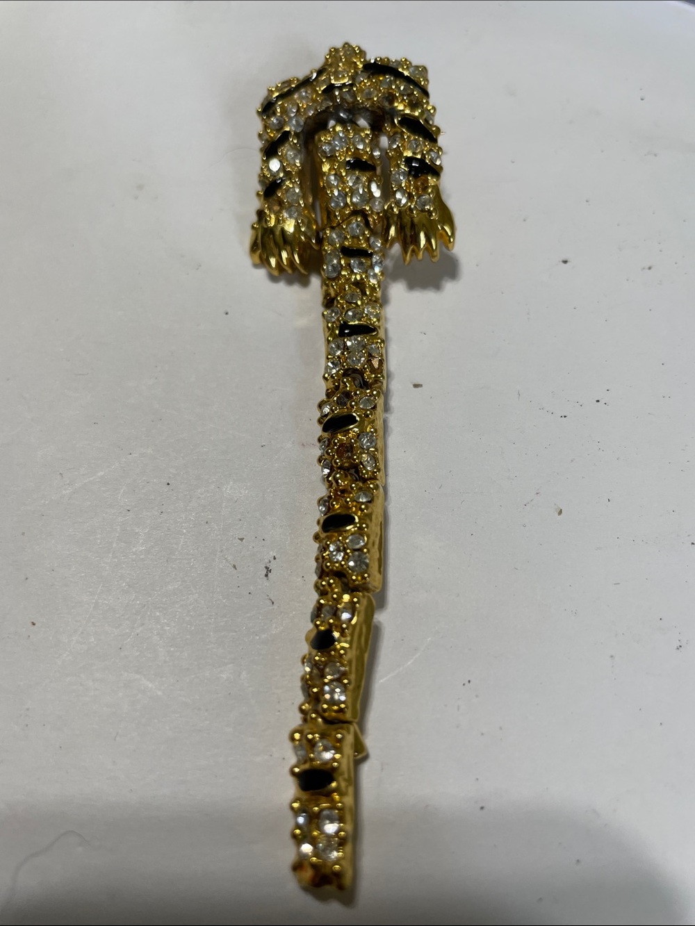 Vintage Tiger Claws/Tail Gold, Crystal and Black Brooch. eBay- $132
